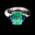 Emerald with Trillion Sapphires Ring